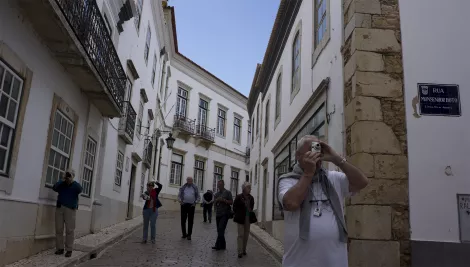 People at the old city of Faro, Portugal People at the old city of Faro, Portugal