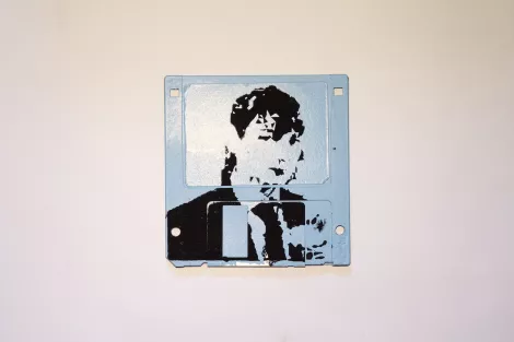 Silkscren of Roni on a 3.5" floppy disk. Contemporary artwork Silkscren of Roni on a 3.5" floppy disk. Contemporary artwork